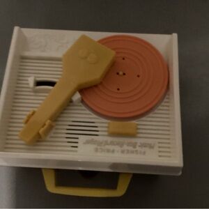 Fisher-Price Toy Record Player with Orange and Tan Accents